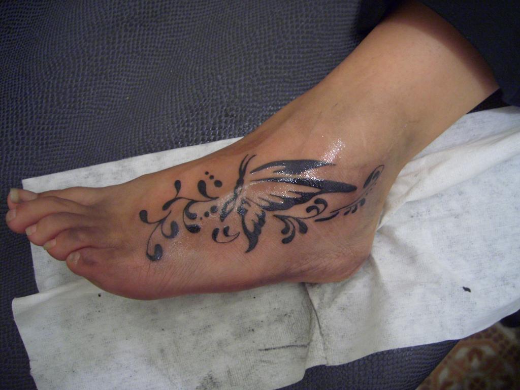 Butterfly Tattoos On Foot Meaning Pictures Designs Butterfly Tattoos On Foot Meaning Pictures Designs