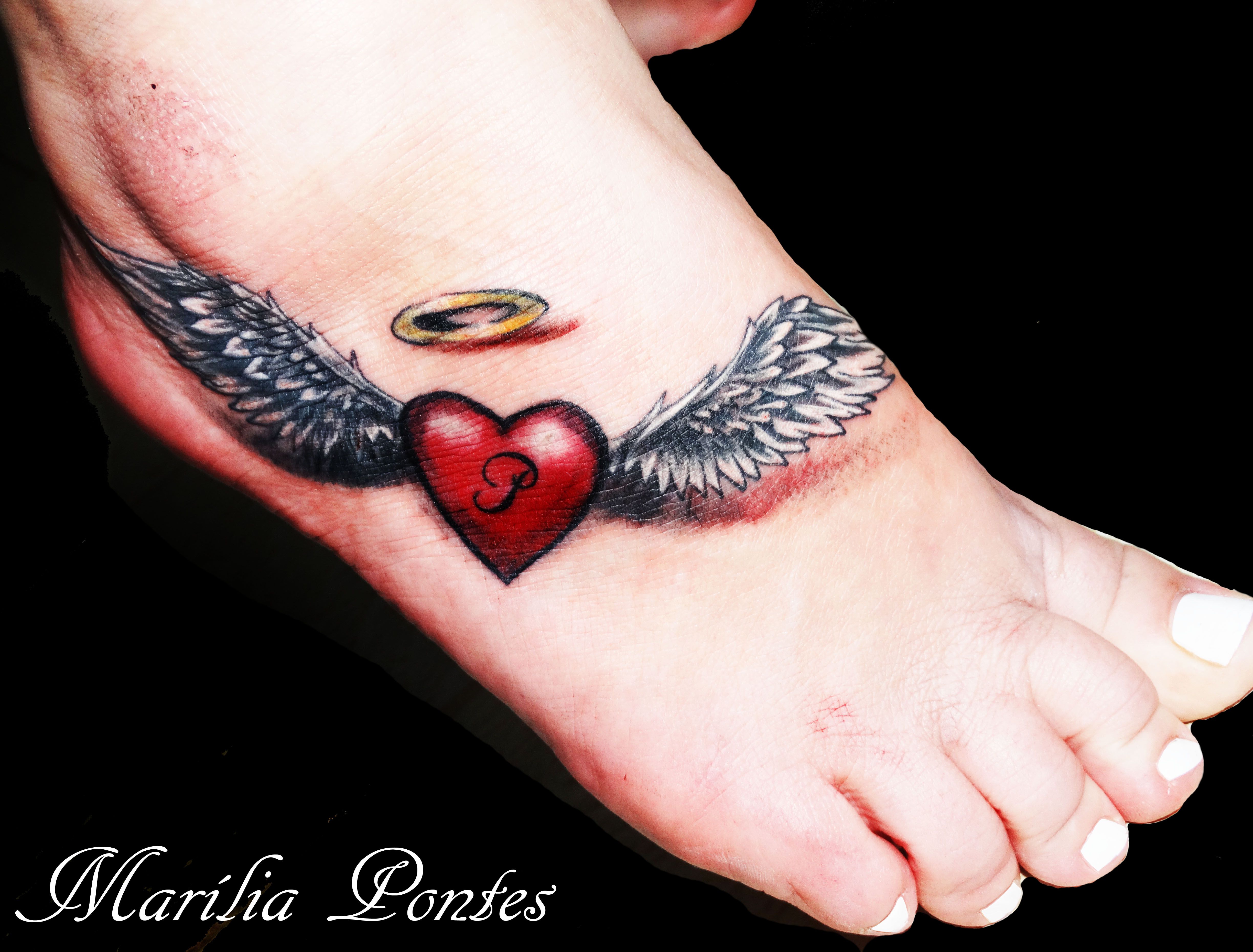Heart And Wings Tattoo: Symbolism & Design Ideas
