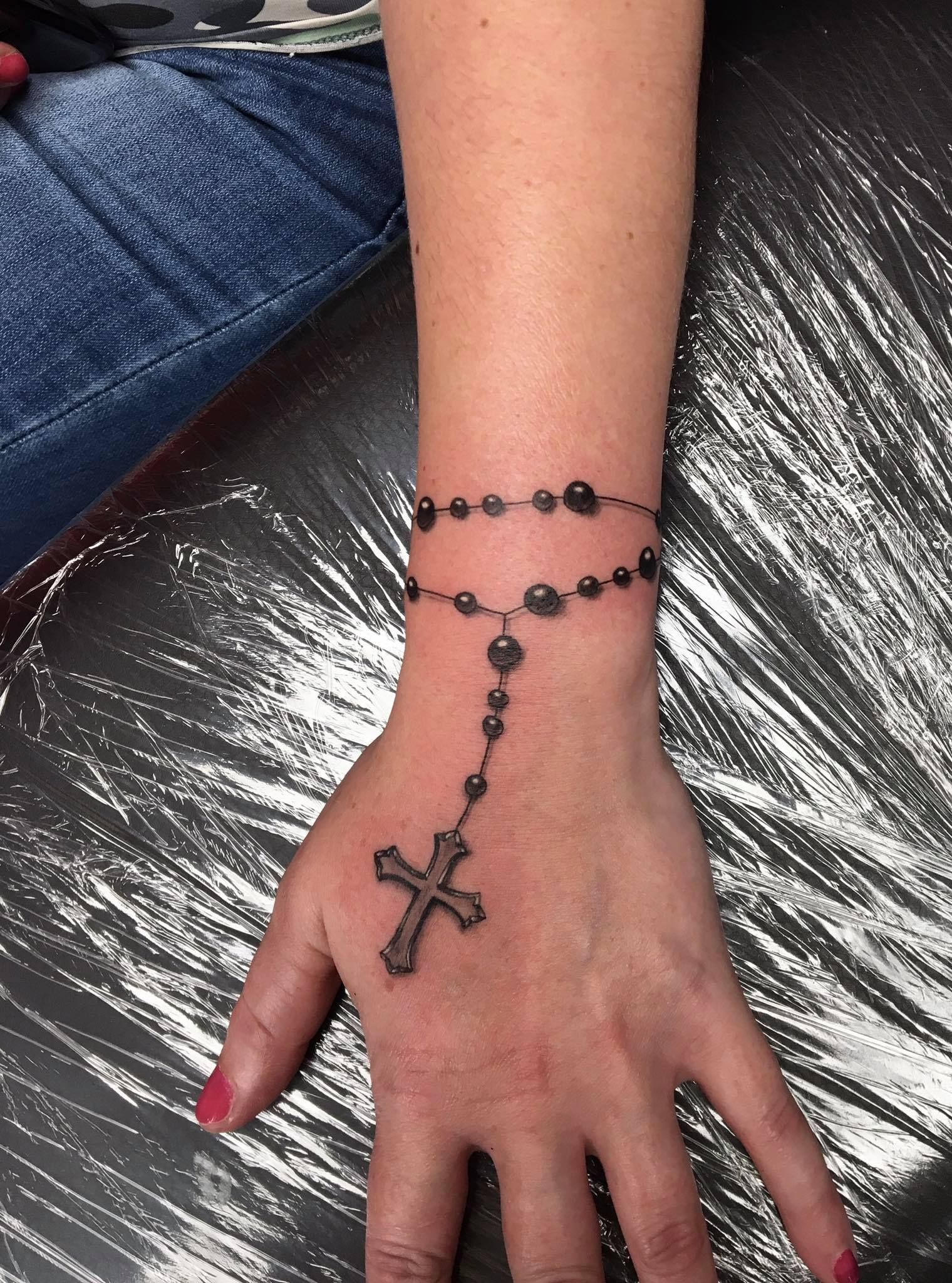 Rosary Wrist Tattoo Ideas: Symbolism & Design Tips  
Wrist Rosary Tattoos: Meaningful & Elegant Designs  
Rosary Tattoo on Wrist: A Timeless Faith Symbol  
Wrist Rosary Tattoos: Spiritual Ink Inspiration  
Elegant Rosary Wrist Tattoos: Design & Meaning