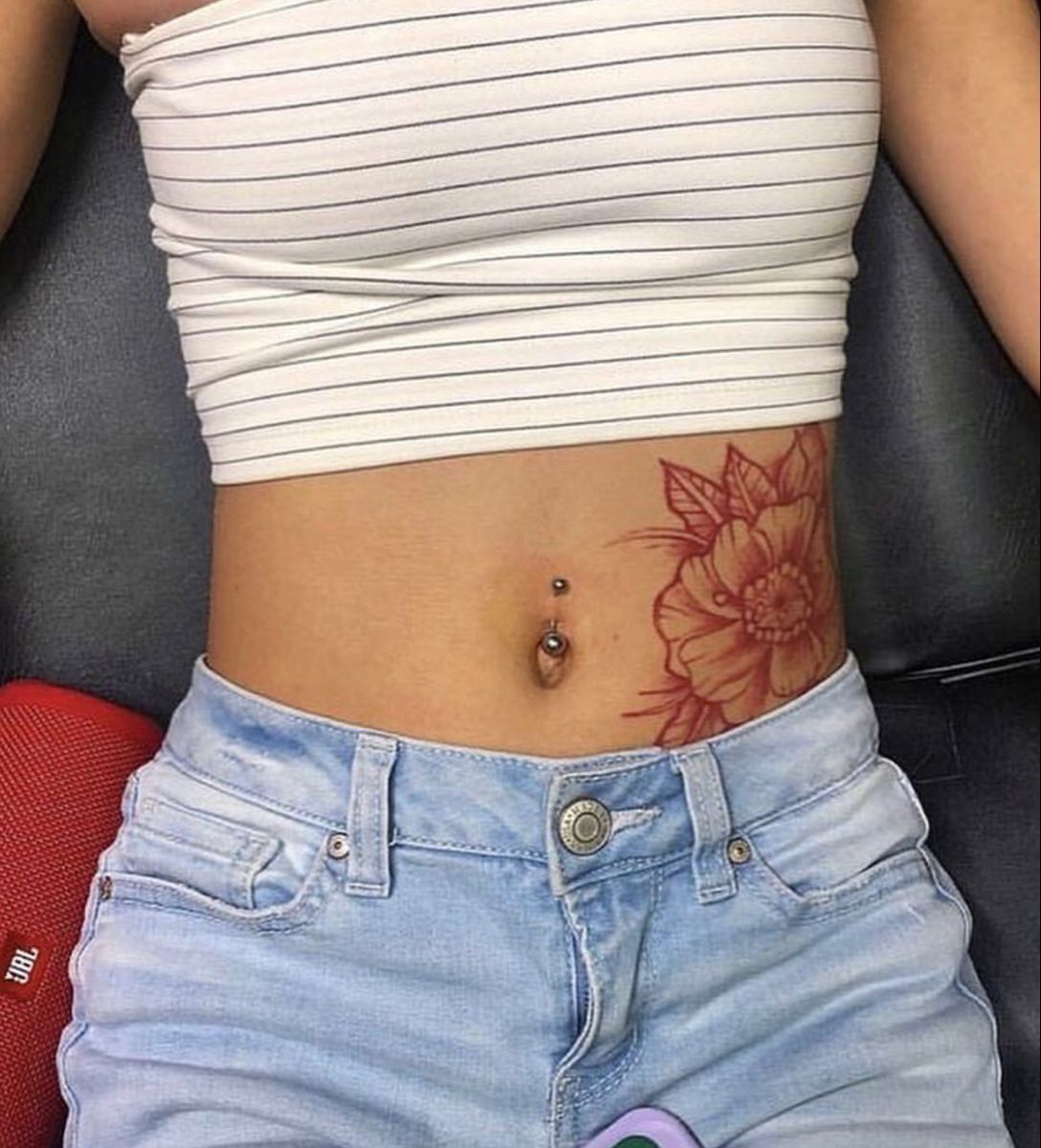 Stunning Female Stomach Tattoos: Ideas & Inspiration Stunning Female Stomach Tattoos: Ideas & Inspiration